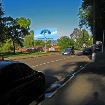 19 – Траса Львів-Ужгород напрямок до Львова, площа Пам’яті, поряд з автобусною зупинкою, сторона Б